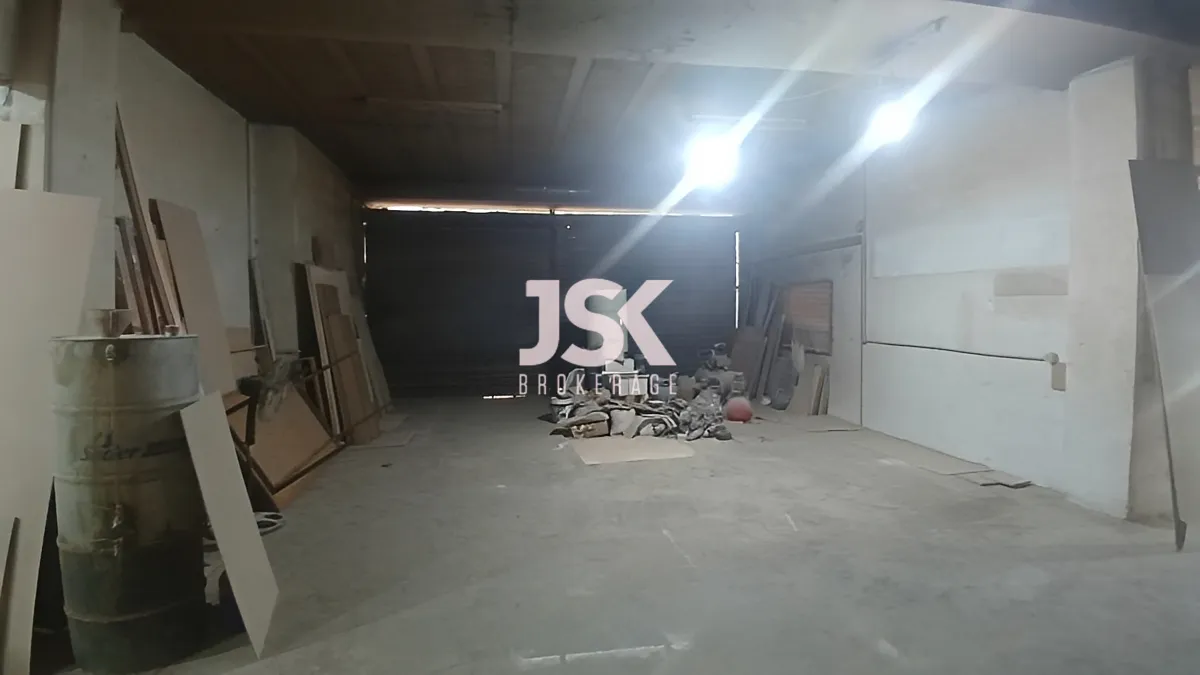 Warehouse for sale in Nahr El Mot