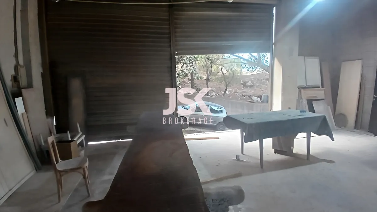 Warehouse for sale in Nahr El Mot