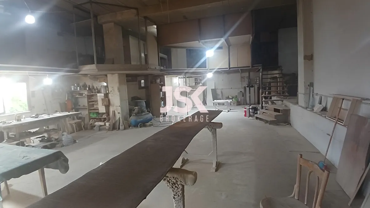 Warehouse for sale in Nahr El Mot